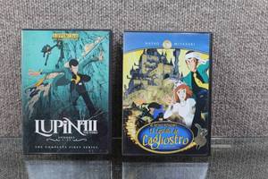 lot 3120 image: Lot of 2 Lupin III DVDs Complete 1st Series (Japanese Audio, English Subtitles) & The Castle of Cagliostro (JapaneseSpanish Audio, Spanish Subtitles ONLY) - WILL SHIP