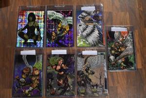 lot 3033 image: Lot of 14 London Night Krome Productions Collectible Large Holographic Comic Cards - WILL SHIP