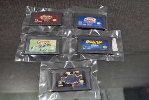 lot 3216 image: Lot of 5 Gameboy Advance Games, Titles Include Scooby-Doo and the Cyber Attack, Sports Illustrated Kids Baseball, Wild Thornberry Movie, Shark Tale & Yu-Gi-Oh Dungeon Dice Monsters - WILL SHIP