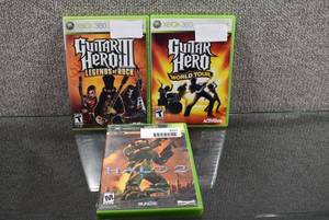 lot 3217 image: Lot of 3 Xbox & Xbox 360 Games, Titles Include Halo 2, Guitar Hero World Tour & Guitar Hero Legends of Rock - WILL SHIP