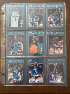 lot 7108 image: 12 Card Set - 1992 ROOKIE OF THE YEAR - Larry Johnson - Vintage Cards