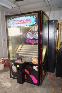 lot 6142 image: Showcase Imposible Magnet Claw Arcade Game Machine
