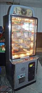 lot 6149 image: Sports ARENA Arcade Machine - Works - If it Stops Next to a Carousel with Prizes, You Win a Prize