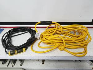 lot 1214 image: Hubbell 25 and 50 foot extension cords excellent condition
