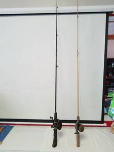 lot 1220 image: 2 fishing poles Rhino and ocean
