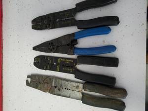 lot 1244 image: four pairs of wire strippers