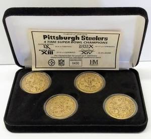 lot 585 image: Highland Mint Pittsburgh Steelers Solid Bronze Medallions  Limited Edition # 0430 of 2500 in Case