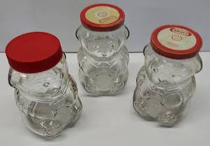 lot 595 image: 3 Vintage Kraft Peanut Butter Bear Glass Jars
