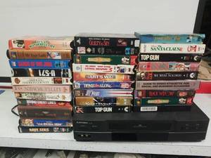 lot 1358 image: Mitsubishi VHS player with VHS tapes