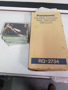 lot 1359 image: Panasonic portable cassette tape recorder with tapes