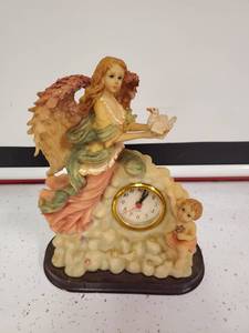 lot 629 image: Angel Clock