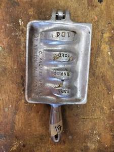 lot 6332 image: Bank Sinker Mold 104