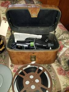 lot 7545 image: Vintage Nikon Video Camera with Case and Video Reel