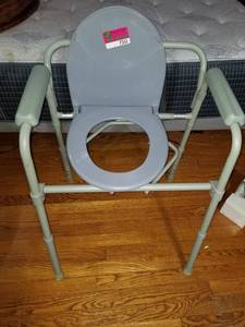 lot 7551 image: Adjustable Toilet Seat Chair. Medical