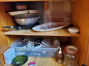 lot 7607 image: Contents of Cabinet (Utensils Vintage Strainer Green Ashtray Goose Lock Seal Cabinet )