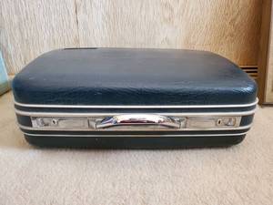 lot 7641 image: Greyhound Navy Blue Hard Plastic Suitcase