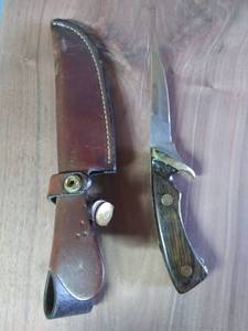 lot 7754 image: Knife with Brown Leather Sheath