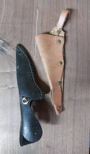 lot 7767 image: Lot of 2 Leather Knife Sheaths 1 brown, One Black