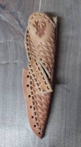 lot 7768 image: Small Unfinished Knife Sheath Basket Weave with Deer
