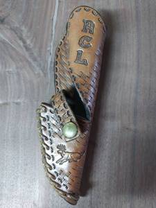 lot 7769 image: Brown Aged Leather Sheath Marked RCL and Running Dear