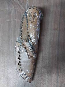 lot 7779 image: Brown Leather Sheath NOS Deer Head