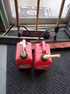 lot 468 image: 2 Gas Cans With Push Broom Lot Bonus