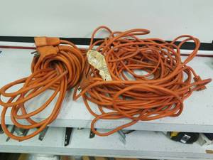 lot 1425 image: 100-foot extension cord and a 50 ft extension cord