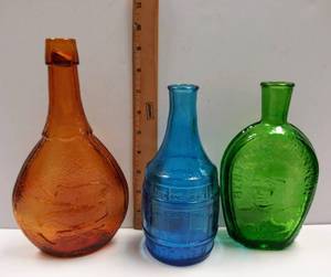 lot 83 image: Vintage Colored Glass Bottles Green-Benjamin Franklin, Amber-UnionHandsDove & Blue