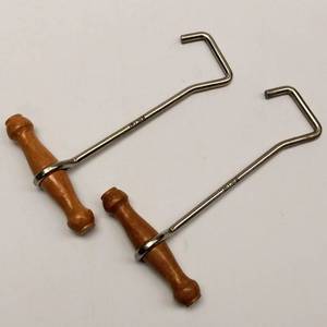 lot 195 image: Wood Handle Boot Hooks By Justin-&nbsp Pull Em UP EZ