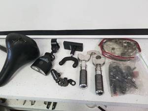 lot 1476 image: Bicycle seat pegs and other miscellaneous parts