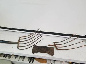 lot 1483 image: 2 Pitch fork end and an axe head