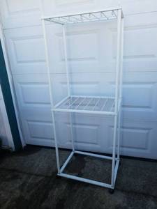 lot 1638 image: a rolling hanging rack