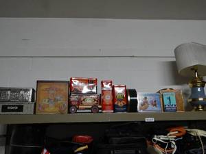 lot 673 image: Shelf of Asst Collectible Tins