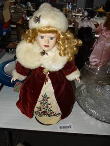 lot 762 image: Porcelain Christmas Doll w Stand