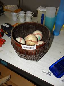 lot 783 image: Basket Of Baseballs and Softball