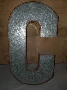 lot 7835 image: Metal Letter C.