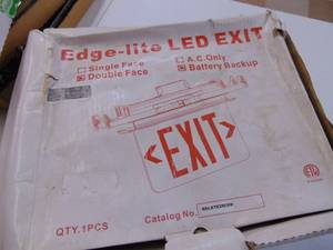 lot 3169 image: Exit Sign - NIB