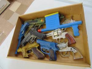 lot 3173 image: Misc. Toy Guns Marx, Buffalo Bill, Sheriffs Badge and More