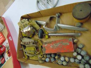lot 3183 image: Vintage Metal Reflectors, Corn Shuckers, Ford Emblem and More