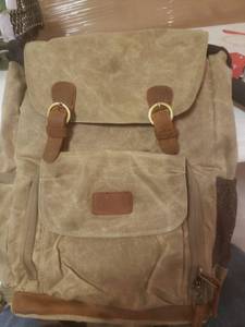 lot 1498 image: Brown Backpack Leather Magnetic Straps