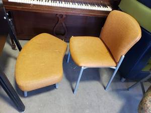 lot 2066 image: Orange chair and foot rest