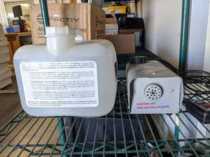 lot 2169 image: Fog Machine With Lighting Enhancement Fluid