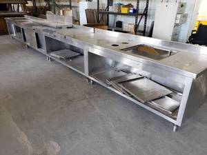 lot 7115 image: Large stainless table line