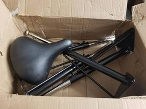 lot 4607 image: 4 Table Legs, Bike Seat