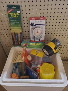 lot 584 image: 20qt cooler with a variety of fishing and camping gear