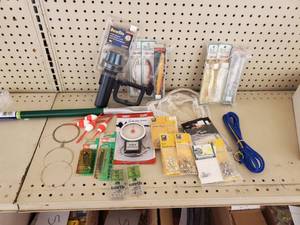 lot 595 image: 2 ft minnow net - Bow light -Rapala -Swivels - Scale and More