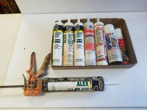 lot 49 image: Caulking gun with caulking