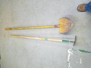 lot 102 image: shovel with a metal handle and a hoe