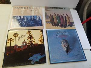 lot 120 image: Foreigner and the Eagles records