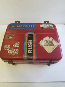 lot 150 image: suitcase with old rock stickers